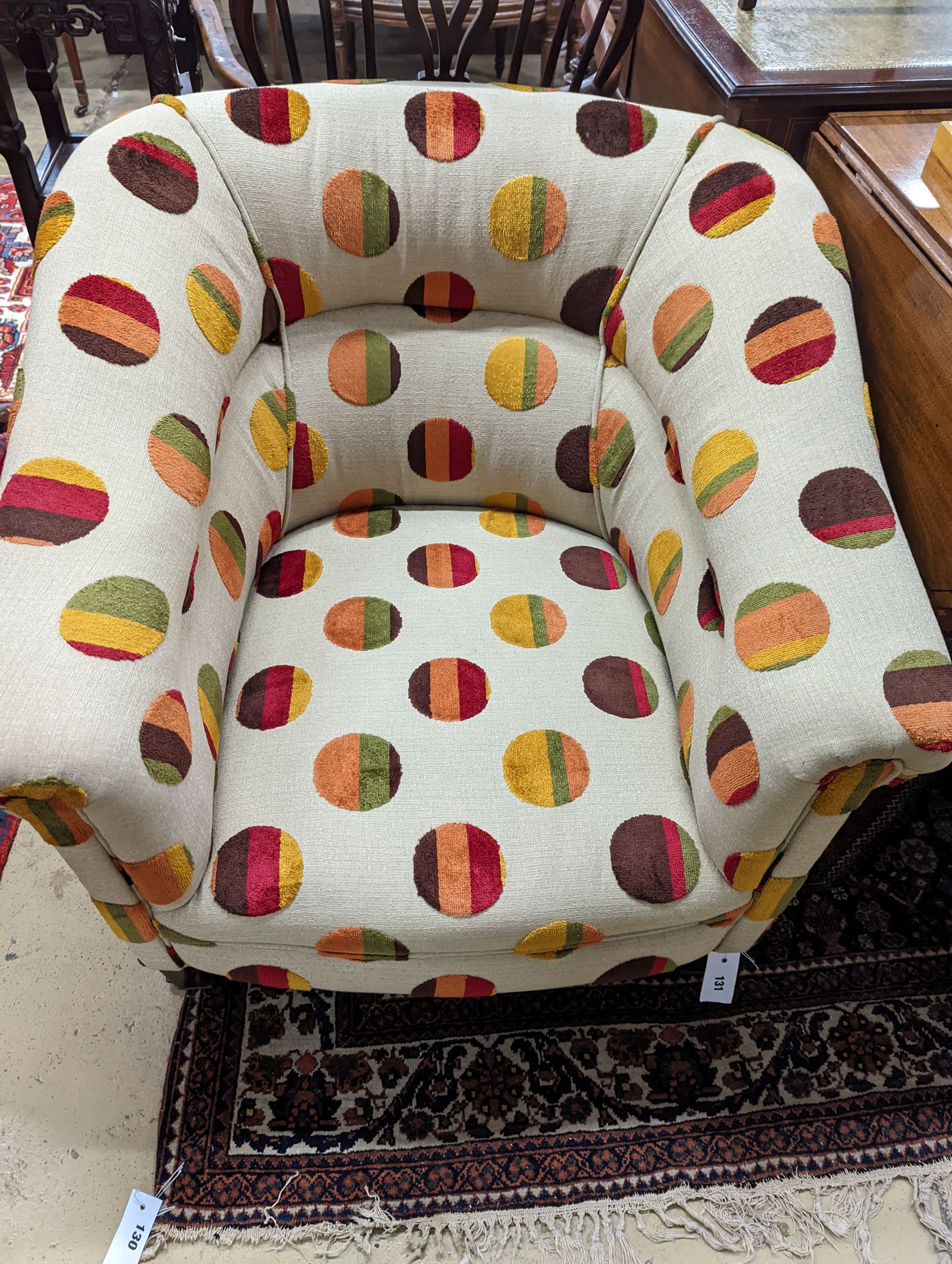 An Edwardian upholstered tub frame armchair, width 76cm, depth 68cm, height 72cm